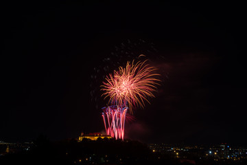 Beautiful colorful firework in city Brno on Spilberk