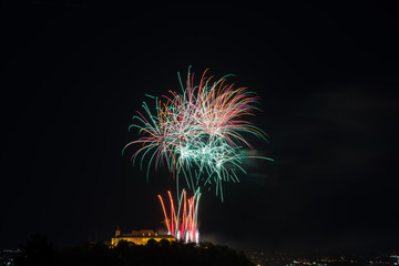 Beautiful colorful firework in city Brno on Spilberk