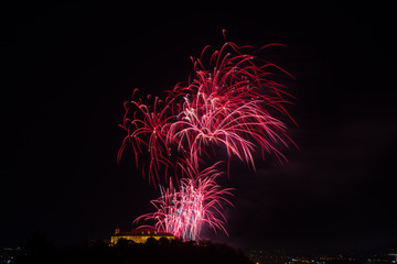 Beautiful colorful firework in city Brno on Spilberk
