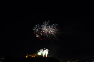 Beautiful colorful firework in city Brno on Spilberk