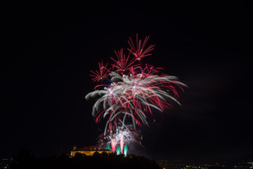 Beautiful colorful firework in city Brno on Spilberk