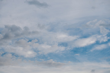 Fantastic soft white clouds against blue sky