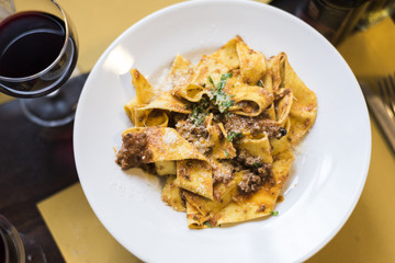 pappardelle with wild boar sauce, Tuscan cuisine