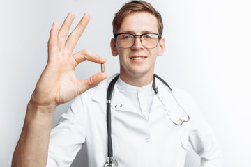Hand doctor holding tablet, close-up, white background, for advertising, text insertion
