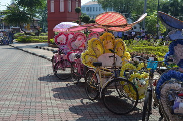 Fototapeta na wymiar Bicycle at the Stadthuys is a historical structure situated in the heart of Malacca City. 