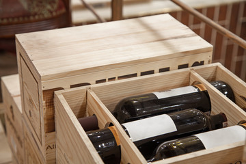 Wine bottles in wood box - Powered by Adobe