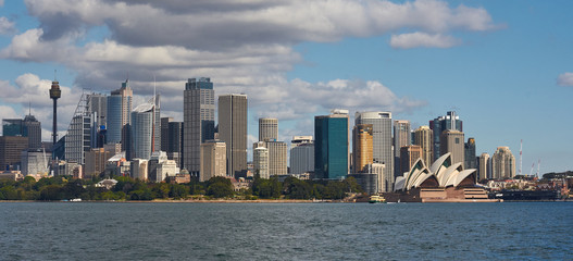 Sydney CBD city and opera house with blue sky and clouds