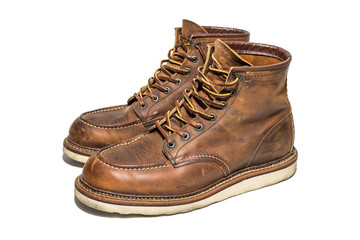 A pair of Brown Leather Boots on white background, isolated