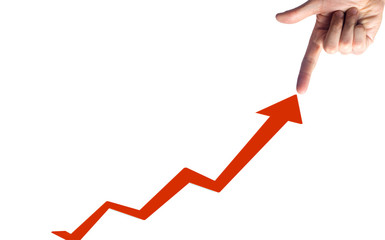 a finger points to a graph of a sustainable development concept, a concept with a chart going up showing growth, profit or success