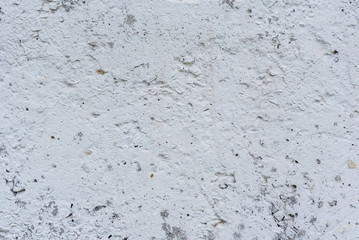 Wall fragment with scratches and cracks