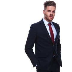 portrait of handsome relaxed businessman in navy suit