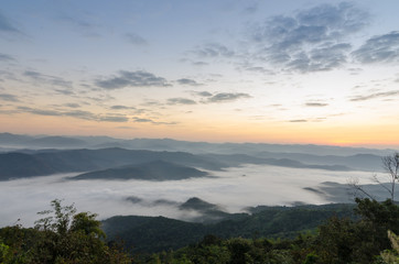 Beautiful clouds and fog among mountain landscape.
