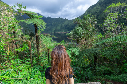 Girl admiring the view at Grand Etang in Saint Benoit, Reunion Island