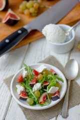 Beautiful vegetarian salad with goat cheese and figs.