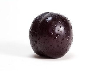 Plum with water drops
