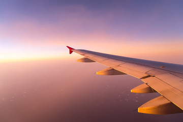 Clouds and sky sunny day through airplane window