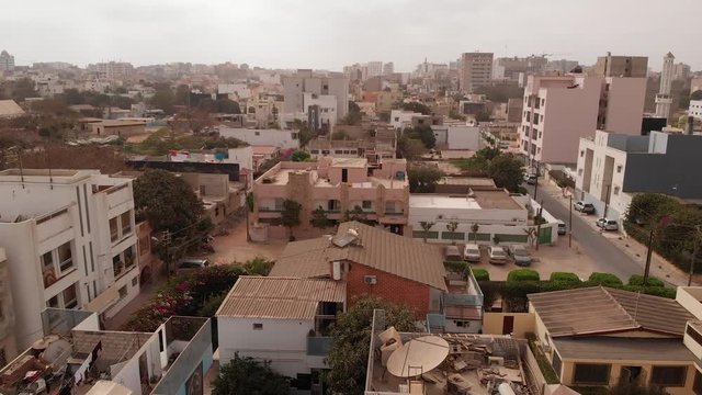 Aerial descending of African city of Dakar, Senegal.