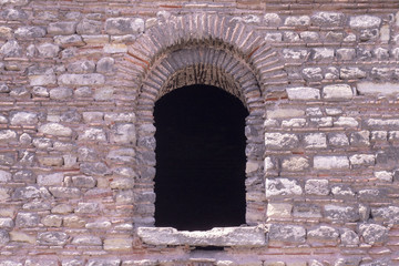 Antique stone masonry, window, arch, niche, wall