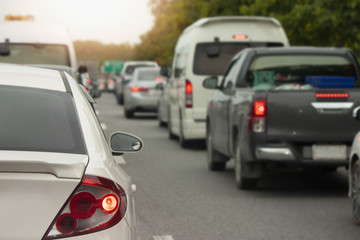 Cars on the road heading towards the goal of the trip.and stop by traffic jam in junction in Thailand.