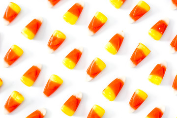 Typical halloween candy corn pattern isolated on white background