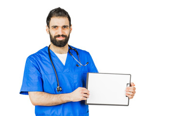 Doctor in blue robe with stethoscope pointing to clipboard isolated on white background