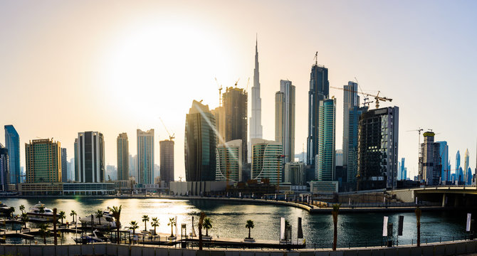 Panoramic view of downtown Dubai cityscape at sunset