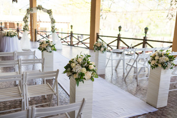 Fototapeta na wymiar Wedding ceremony decorations on the terrace