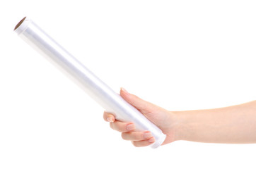 Wrapping plastic stretch film in hand on white background isolation