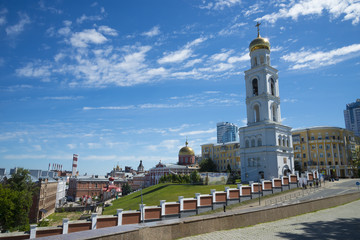 Fototapeta na wymiar Bell tower with the Church of St. Nicholas in Samara, Russia. On a Sunny summer day. 17 June 2018