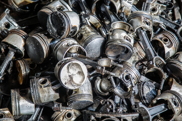 a bunch of old metal parts and automotive assemblies ready for recycle