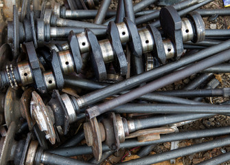 a bunch of old metal parts and automotive assemblies ready for recycle