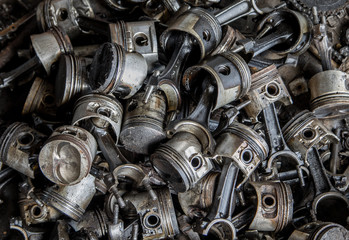 a bunch of old metal parts and automotive assemblies ready for recycle