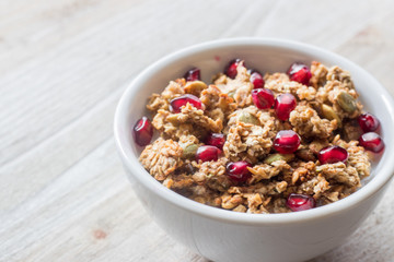 Granola Bowl with Pomegranate Seeds