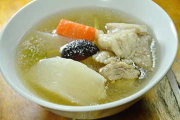 boiled radish with pork bone soup on bowl