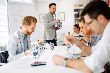 Obraz premium Colleagues eating in office