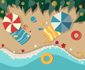 Sandy beach with leisure items. View from above. Vector illustration.