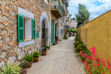 Fototapeta na wymiar Traditional house architecture in Porto Soller village, Palma de Mallorca island