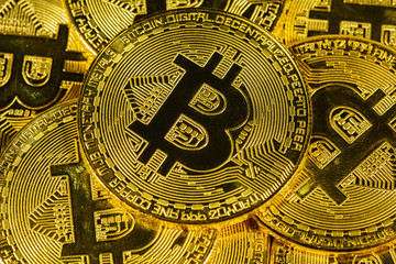 Fototapeta na wymiar Cryptocurrency physical gold bitcoin