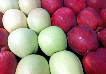 Red and green apples background.