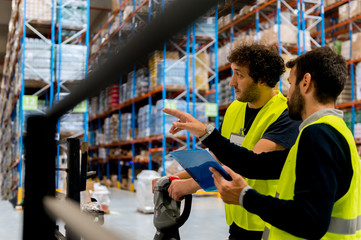 Forklift driver in warehouse