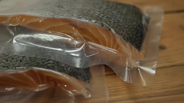 Fresh Norwegian Salmon fillet packaging in seal Vacuum pouch.