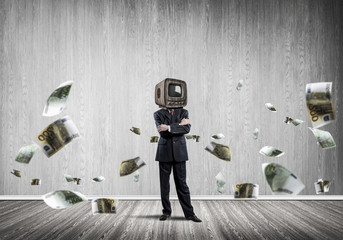 Businessman with old TV instead of head.
