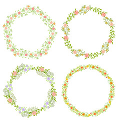 Set of wreath of wild flowers with leaves. A floral round frame with a place for your text.