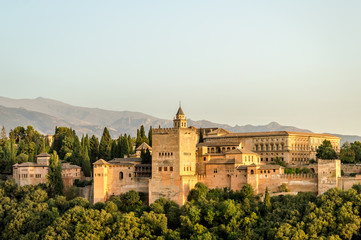 Fototapeta na wymiar Telephoto view of the moorish Alhambra palace with its famous architecture from the hills of Granada, Andalusia, Spain