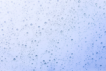 Drops of the rain on the home window
