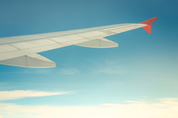 Airplane Wing Out of Window.Vintage Tone