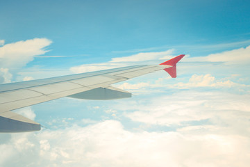 Airplane Wing Out of Window.Vintage Tone