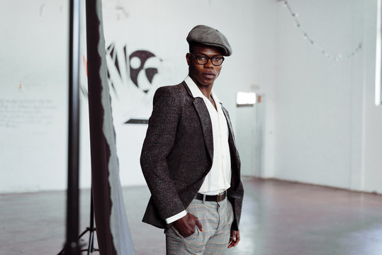Stylish black man posing in studio