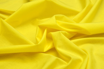 Bright yellow cotton fabric with added elastane for blouses.