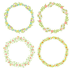 Set of wreath of wild flowers with leaves. A floral round frame with a place for your text.